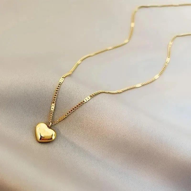 Elegant hjertehalskæde – Guld/Sølv