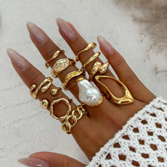 Meralia ringesæt – Sæt med 12 metalringe med perledetaljer og geometriske former