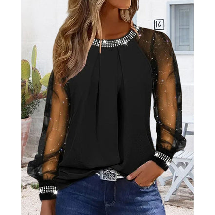 Lumira bluse til kvinder med rund hals, transparente lange ærmer og løs pasform