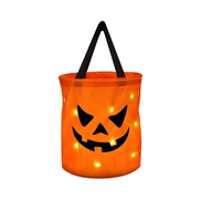 Halloweenové sladkostové vedro s motívom tekvice a LED osvetlením – Lumivaro