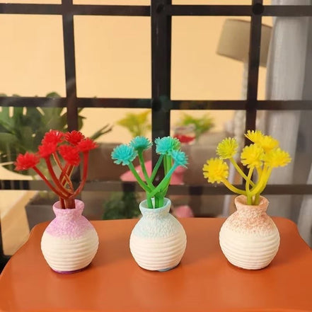 Varena mini blomstervase i resin – lille vase til bord eller hylde