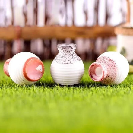 Varena mini blomstervase i resin – lille vase til bord eller hylde