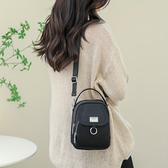 Melora Crossbody Bag – Let nylon taske med flere lynlåslommer
