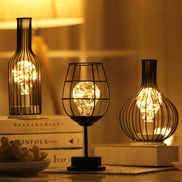 Trinexa bordlampe i stål – lampe med trådkurvdesign til bordplacering