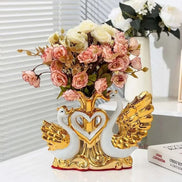 Aviora blomstervase i keramik – fugleinspireret vase i guldfarve