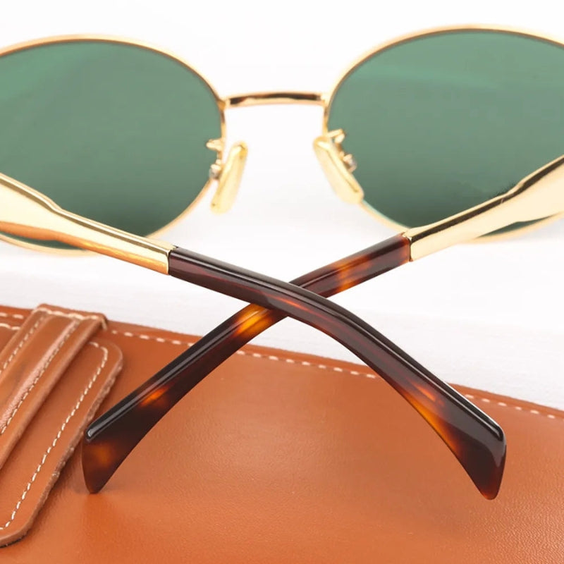 Unisex solbriller med ovalt metalstel og justerbare næsepuder – solbriller til hverdag og udendørs brug – Zenvira