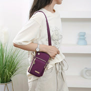 Veloria Crossbody Bag – let nylon taske med lynlåslukning