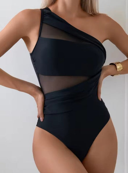 Méshara dame badedragt – asymmetrisk badedragt med shaping og mesh detaljer