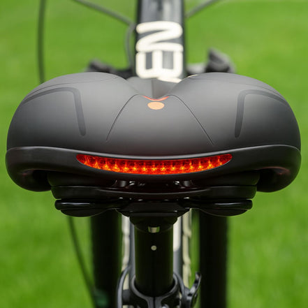 Cyklistické sedlo s integrovaným odpružením a odrazkou – Velospera