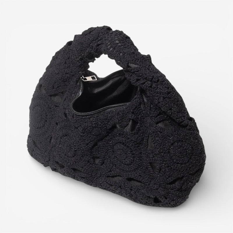 Arvella handbag med udskåret mønster