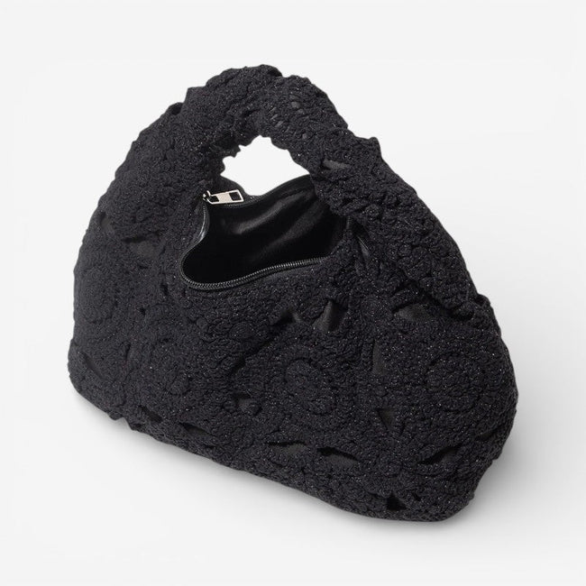 Arvella handbag med udskåret mønster