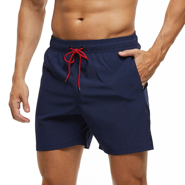 Hurtigtørrende badeshorts til herre med lynlåslommer og elastisk talje – shorts til strand og svømning – Aquenor