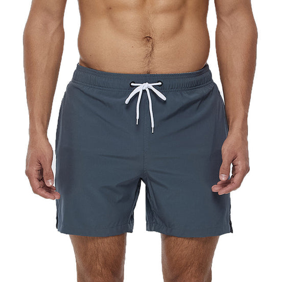 Hurtigtørrende badeshorts til herre med lynlåslommer og elastisk talje – shorts til strand og svømning – Aquenor