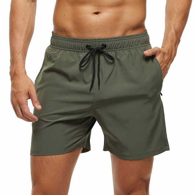 Hurtigtørrende badeshorts til herre med lynlåslommer og elastisk talje – shorts til strand og svømning – Aquenor