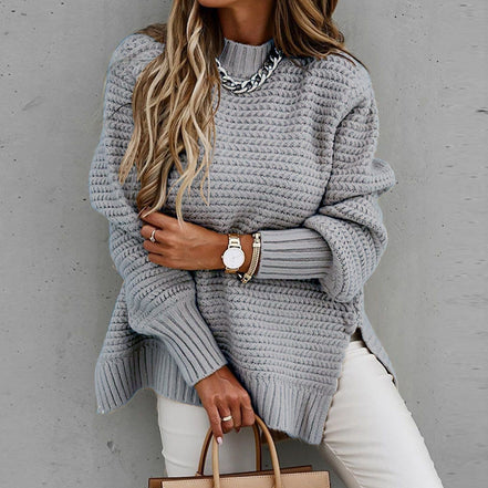 Oversized damepullover med høj hals og sideslidser – Solvaya
