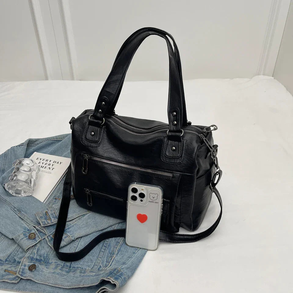 Sorina skuldertaske med rummelig indretning