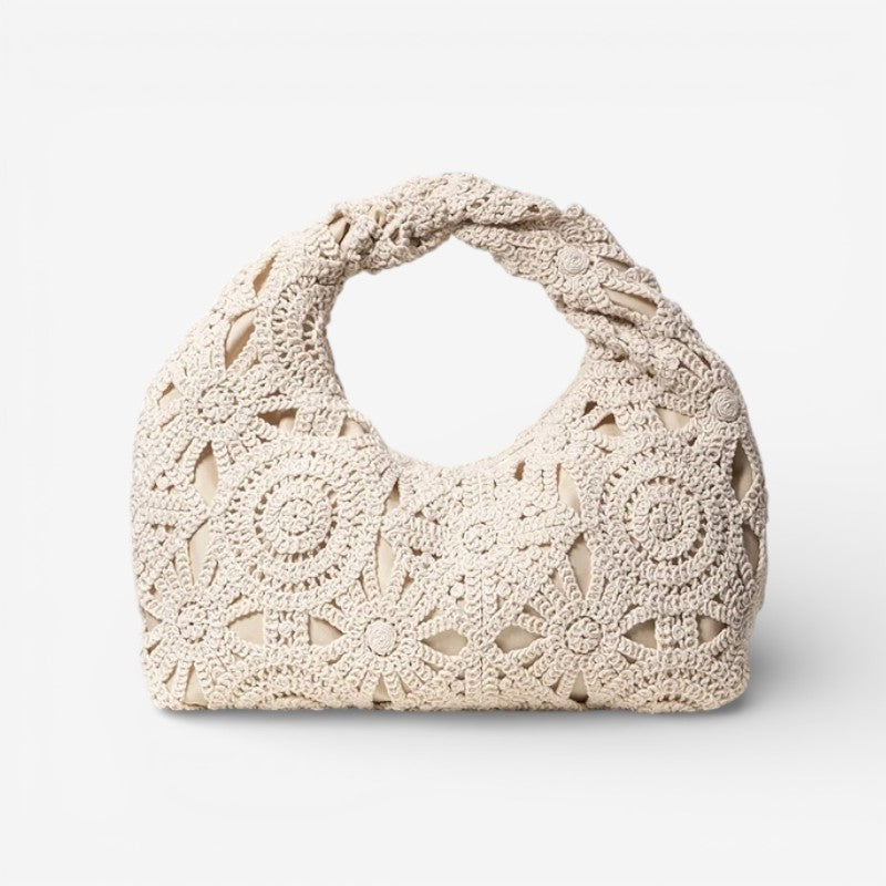 Arvella handbag med udskåret mønster