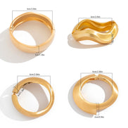 Valora Wide Cuff Armbånd – Bredt åbent metalarmbånd i guldfarve