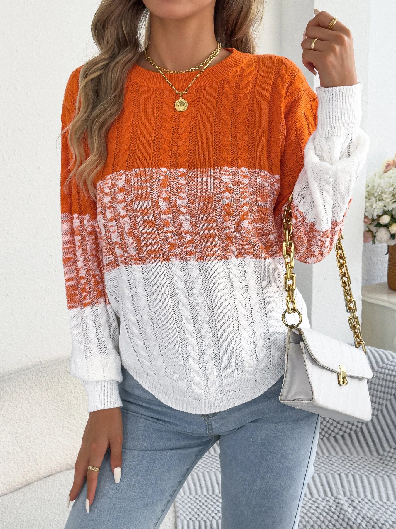 Malira strikket trøje med stribet mønster og lanterneærmer