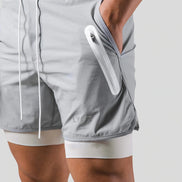 Axton 2-i-1 sportsshorts – let design med inderlag
