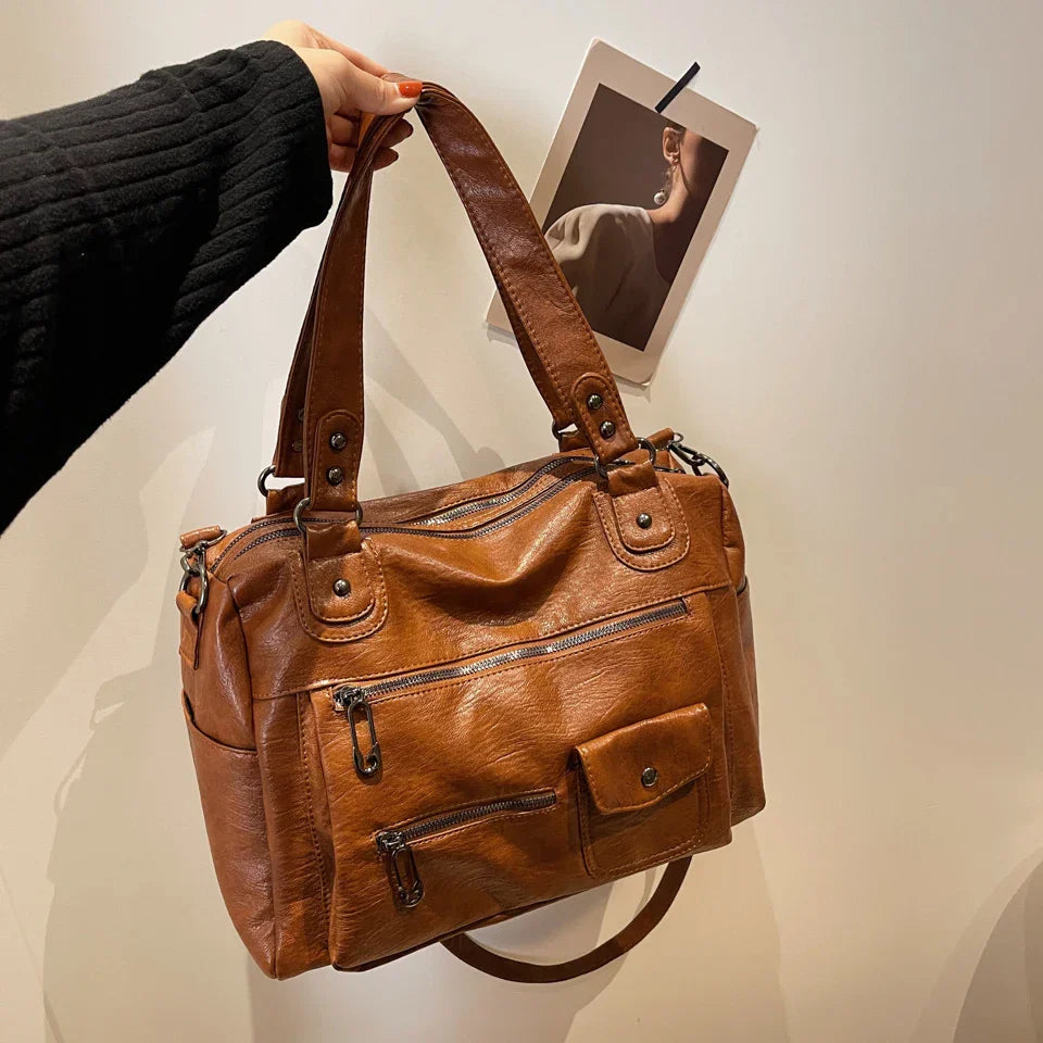 Sorina skuldertaske med rummelig indretning