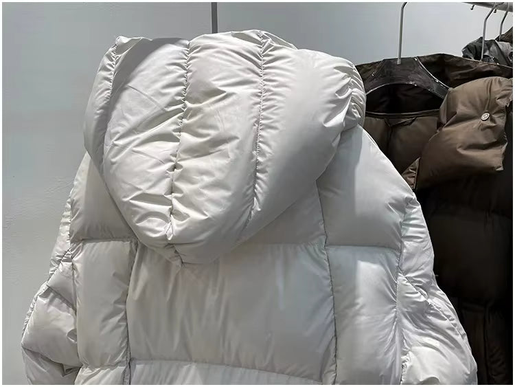 Norvia dunjakke – let vatteret vinterjakke med hætte