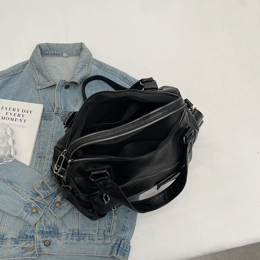 Sorina skuldertaske med rummelig indretning