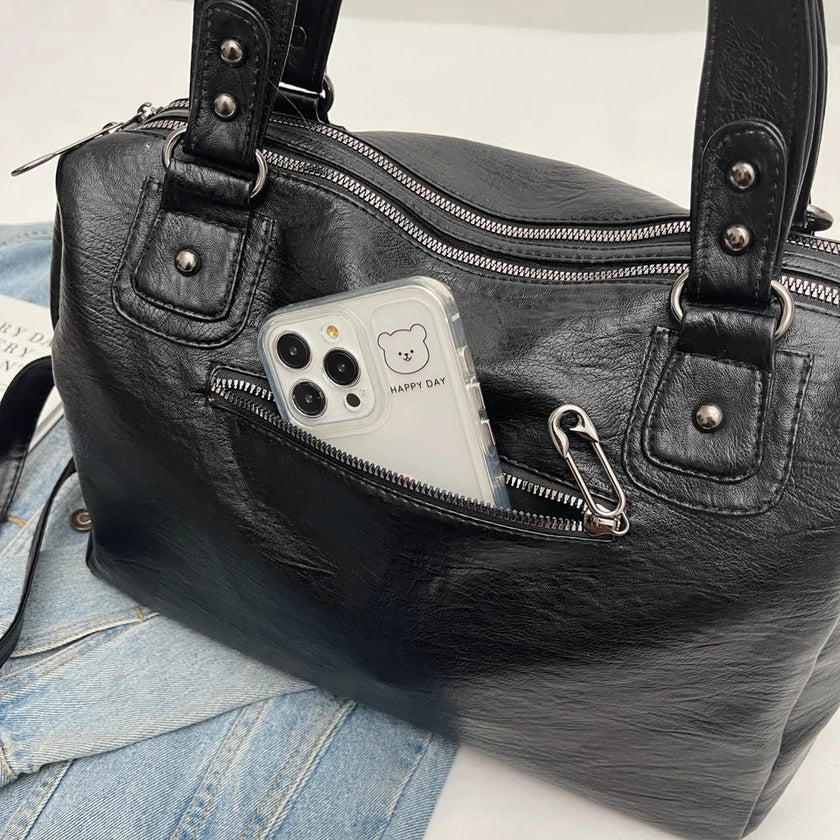 Sorina skuldertaske med rummelig indretning