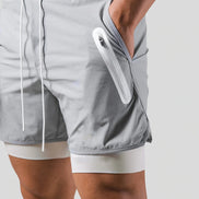 Axton 2-i-1 sportsshorts – let design med inderlag