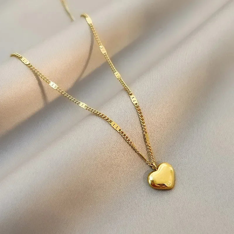 Elegant hjertehalskæde – Guld/Sølv