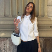 Cropped blazer med korte ærmer og knaplukning – Novelle