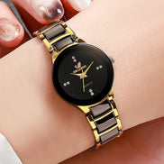 Selvina dameur med metalrem