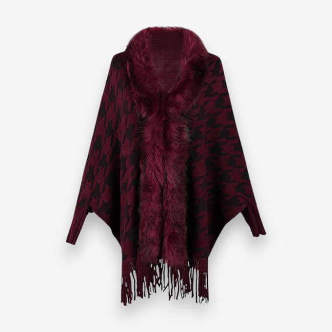 Stellara poncho med krave og stjernemønster