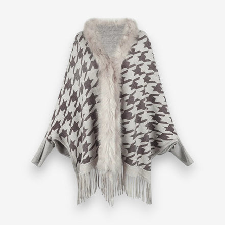 Stellara poncho med krave og stjernemønster