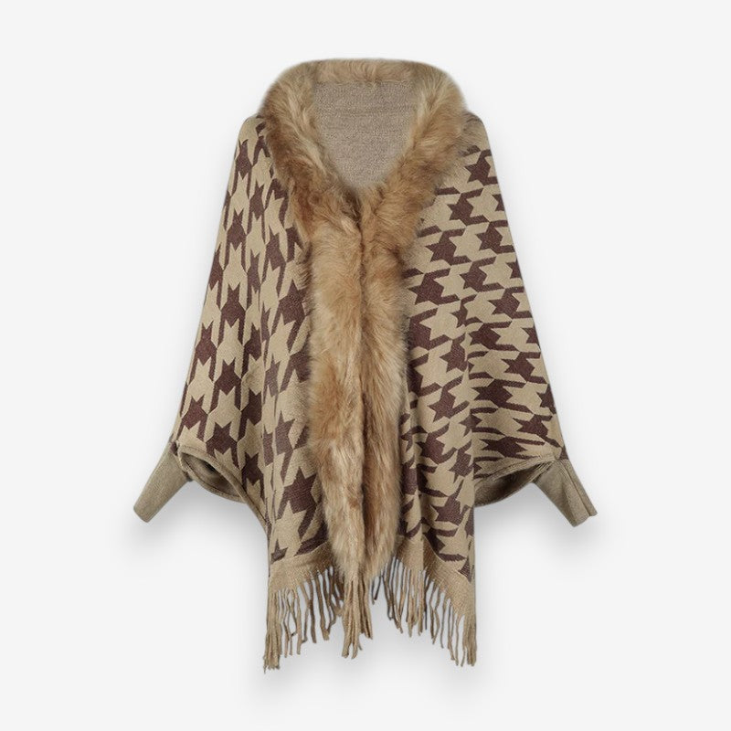 Stellara poncho med krave og stjernemønster