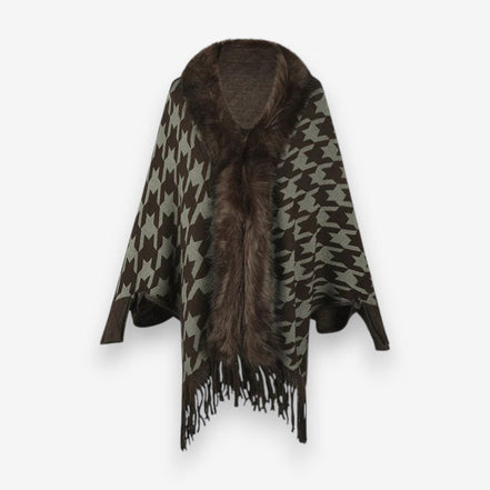 Stellara poncho med krave og stjernemønster