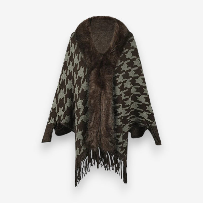 Stellara poncho med krave og stjernemønster