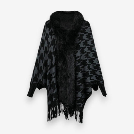 Stellara poncho med krave og stjernemønster