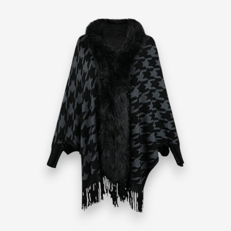 Stellara poncho med krave og stjernemønster