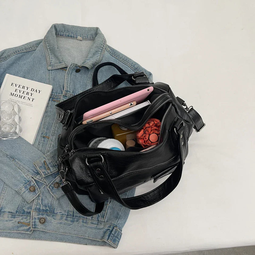 Sorina skuldertaske med rummelig indretning