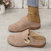 Solveta slip-on træsko med åben hæl og afrundet tå