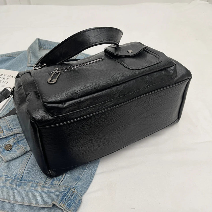 Sorina skuldertaske med rummelig indretning