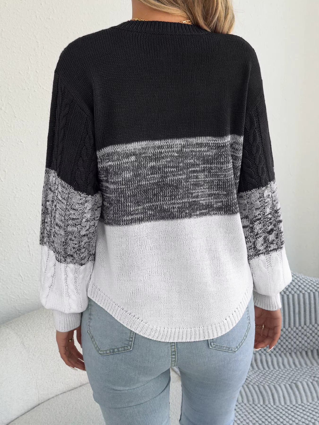 Malira strikket trøje med stribet mønster og lanterneærmer