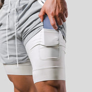 Axton 2-i-1 sportsshorts – let design med inderlag