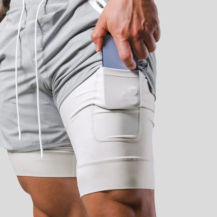 Axton 2-i-1 sportsshorts – let design med inderlag