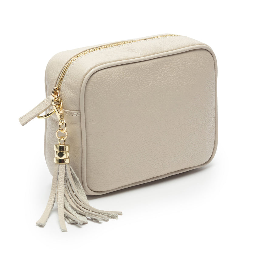 Amelira skuldertaske med mønstret rem