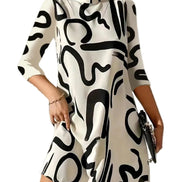 Minikjole med rund hals og 3/4 ærmer – kjole til hverdag og fritid – Elvara