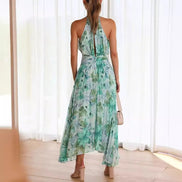 Henrietta dame maxikjole – blomsterkjole med halterneck og ærmeløst design
