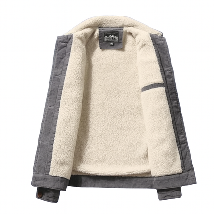 Binnenkant van heren corduroy jas met zachte fleecevoering in crème kleur