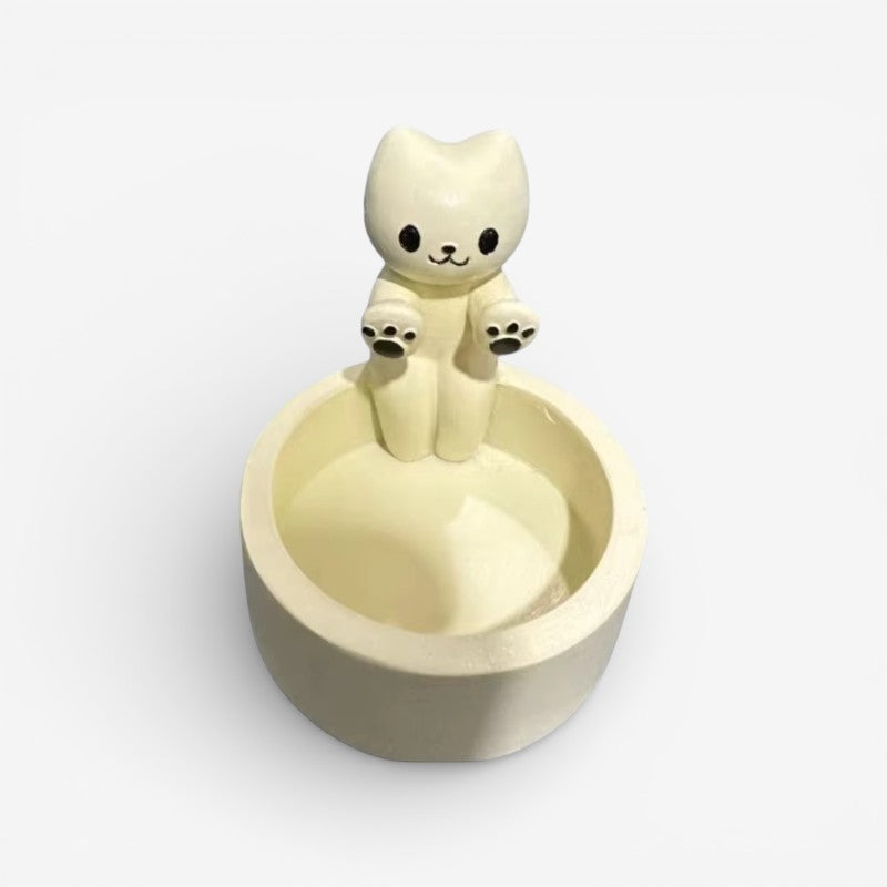 Felira lysestage i resin – katteinspireret holder til bord eller hylde